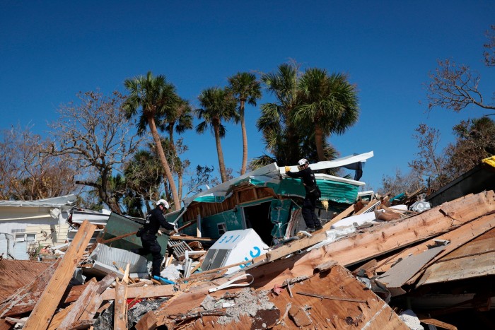 A rescue team in Florida searches for victims following Hurricane Ian in 2022