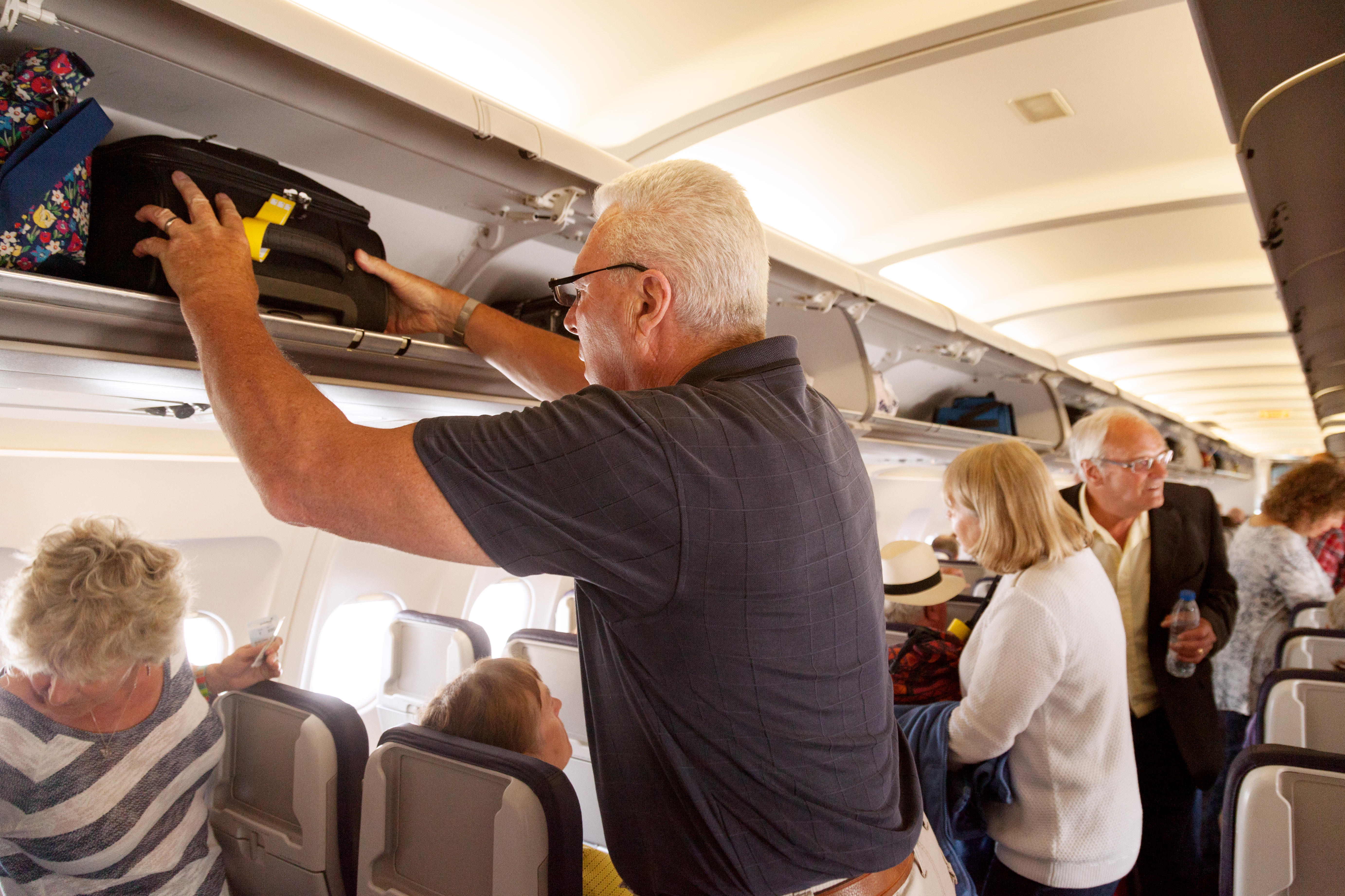 Some experts are calling for overhead bins to be scrapped completely
