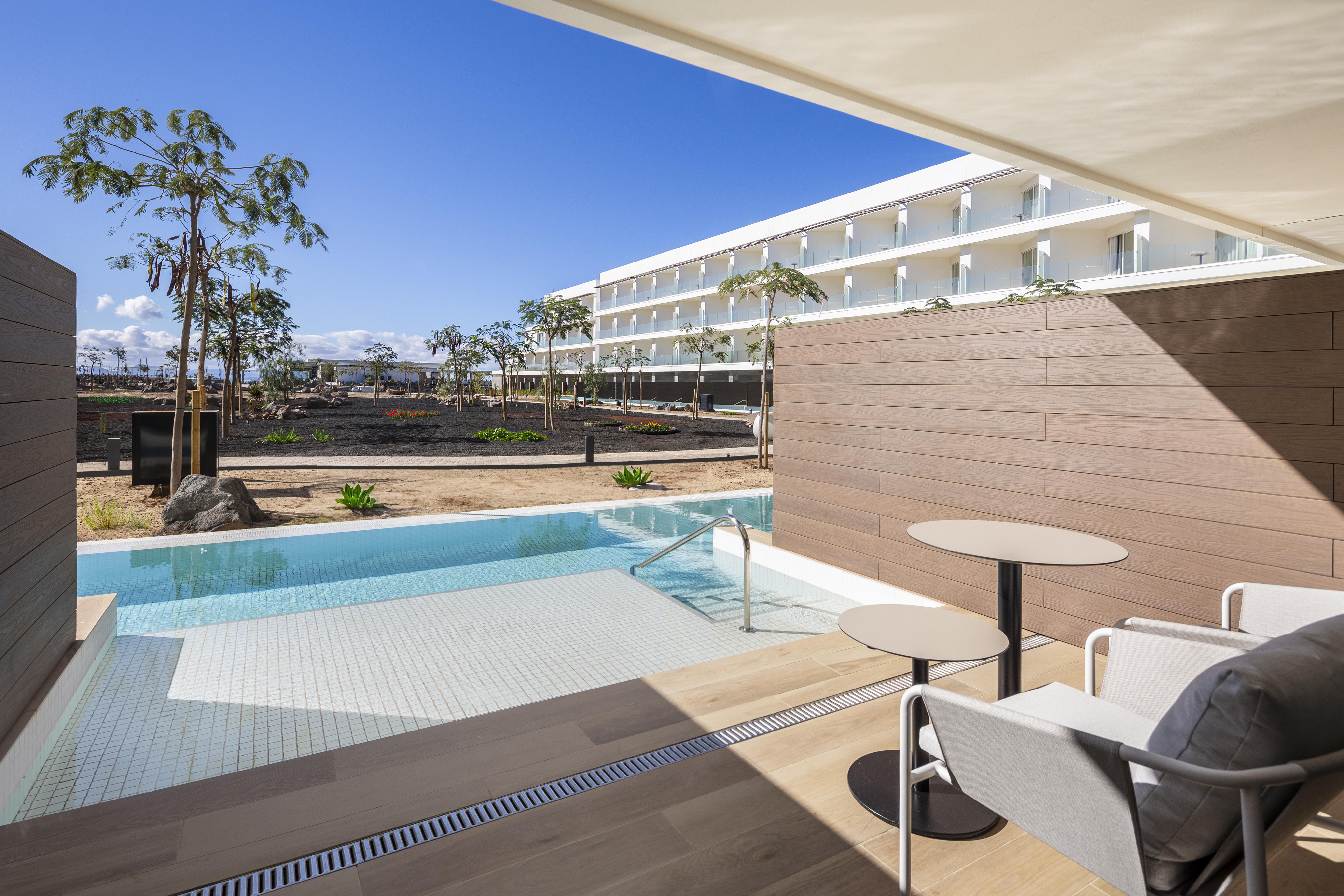 Take a dip from the terrace of the swim-up room