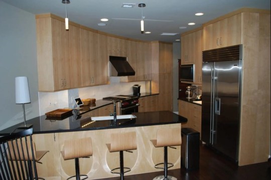 This kitchen from Survival Condo wouldn't look out of place in a regular New York condo