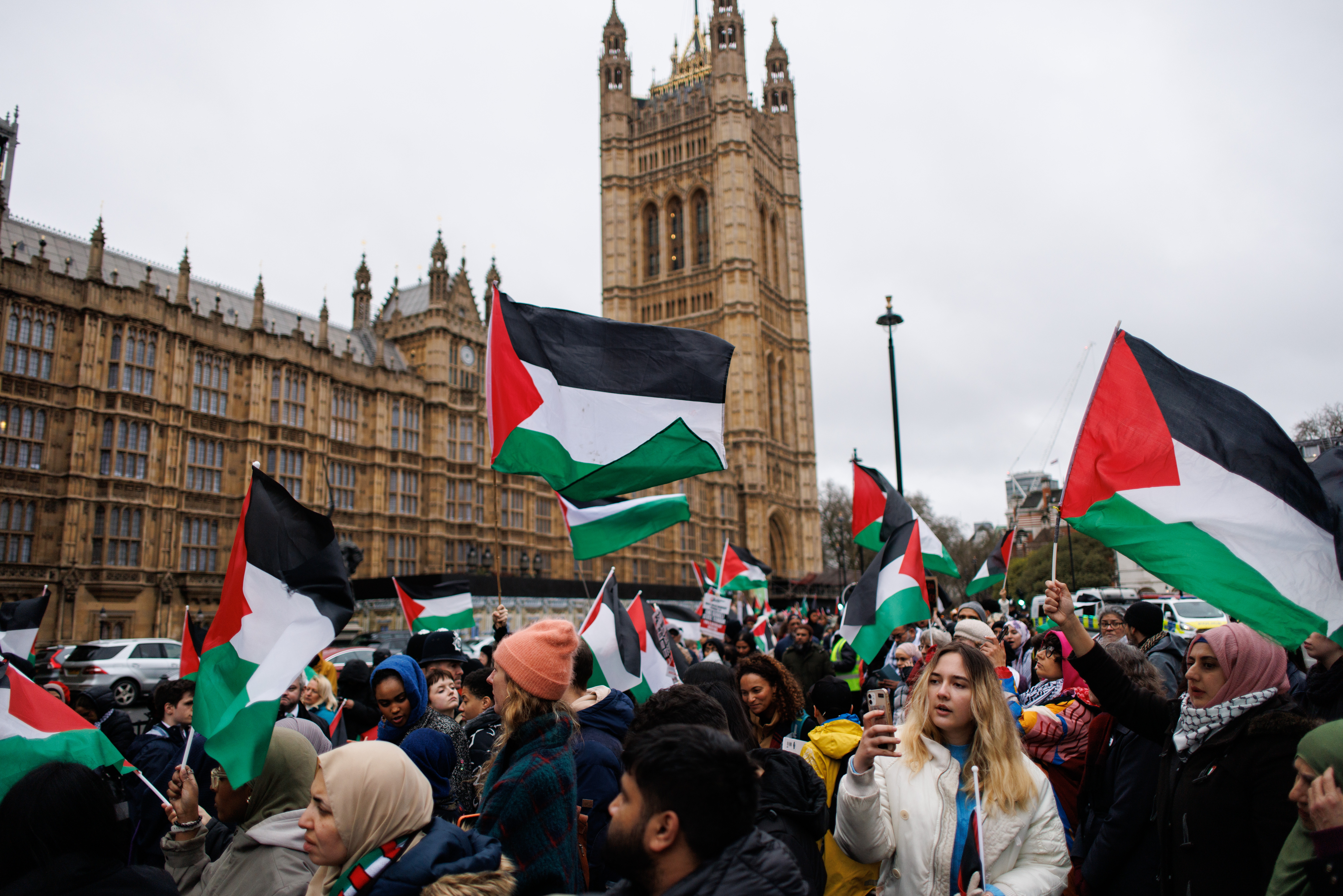 Pro-Palestinian protesters queue for Houses of Commons