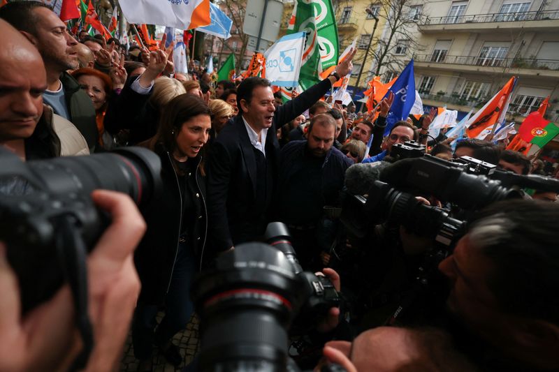 Portuguese head to polls as right, left seen almost evenly matched