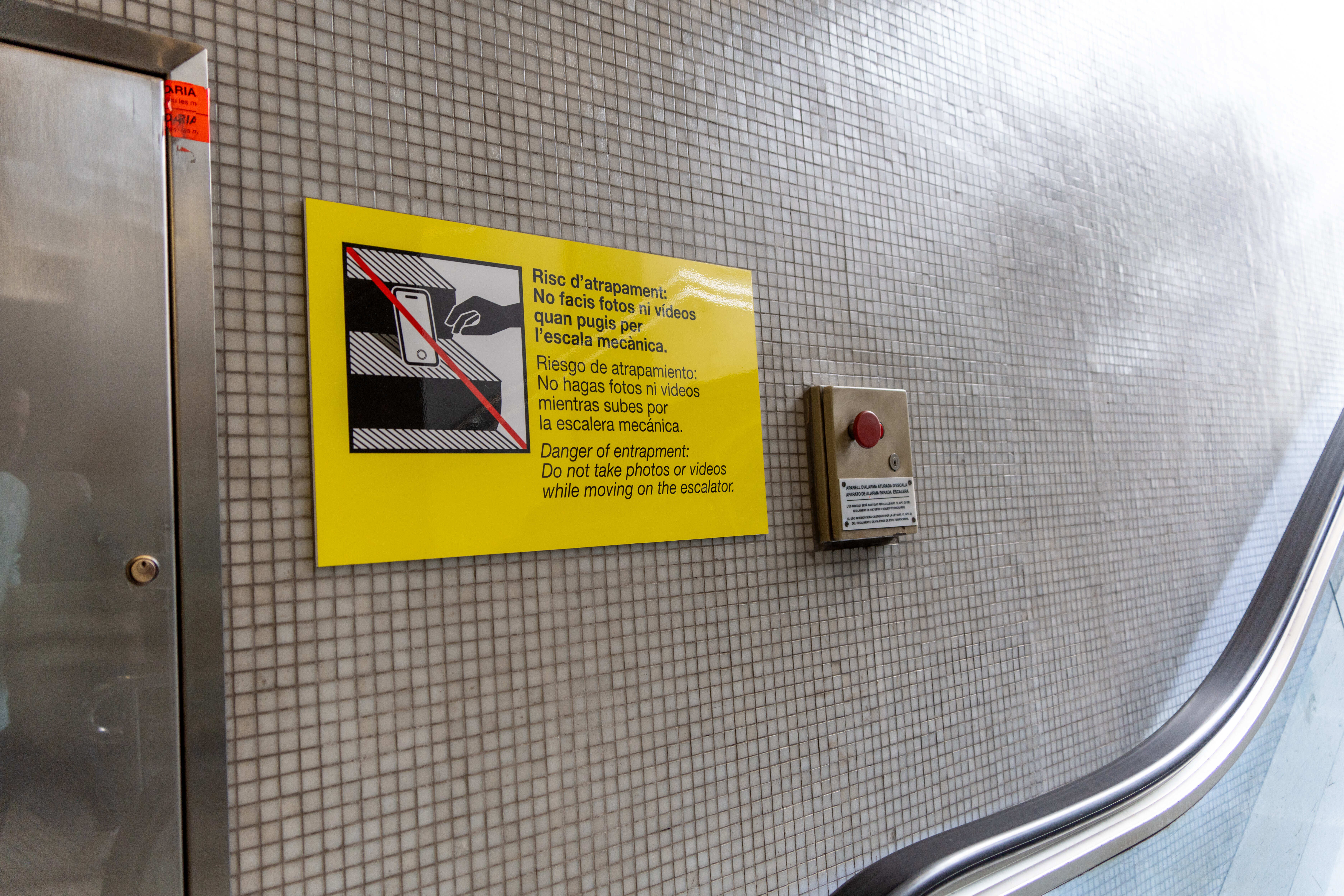 Posters banning tourists from taking photos and videos on the escalators appeared over the weekend
