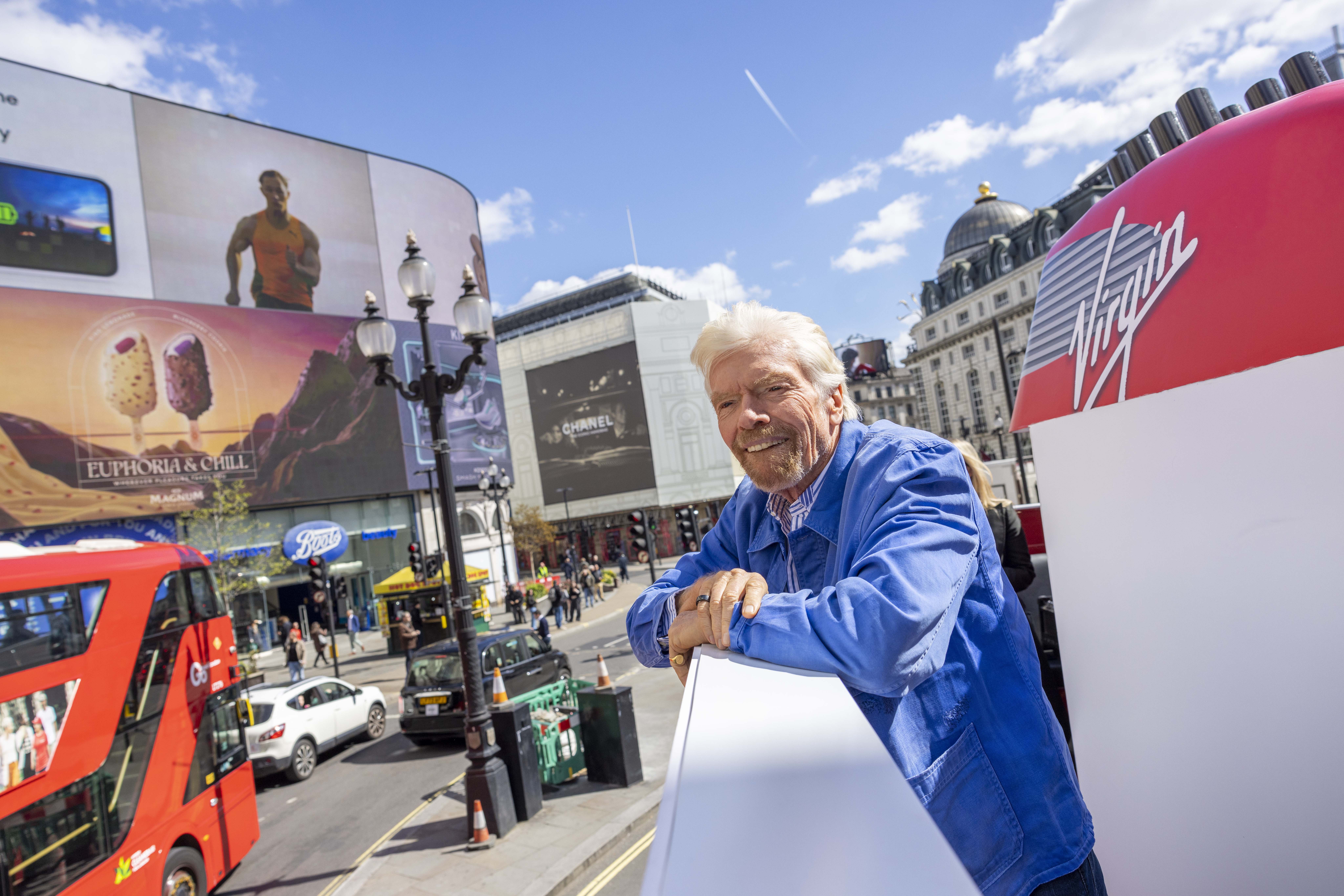 Sir Richard Branson took to the streets to personally hand out 200 free cruise vouchers