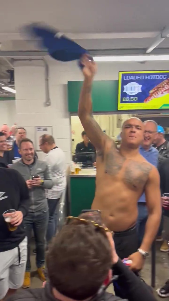 Fabio Wardley swung his shirt around his head in the concourse