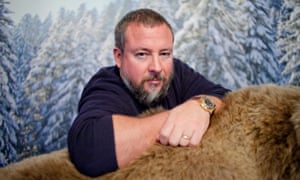 Shane Smith - co-founder of Vice Media - rests his hands on a furry surface and stares directly at the camera. 
Photograph by Tim Knox
Commissioned for MEDIA