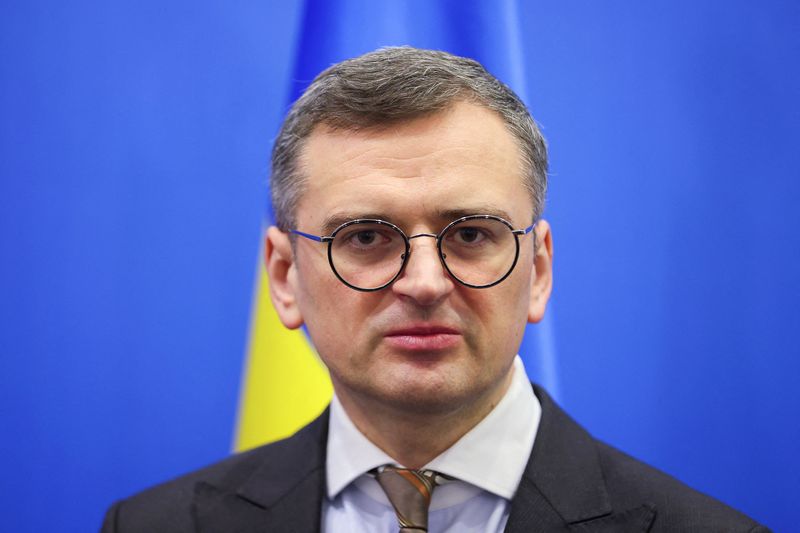 © Reuters. FILE PHOTO: Ukraine's Foreign Minister Dmytro Kuleba looks on, on the day of a bilateral meeting with U.S. Secretary of State Antony Blinken (not pictured), at the NATO Alliance's headquarters in Brussels, Belgium April 4, 2024. REUTERS/Johanna Geron/Pool/File Photo