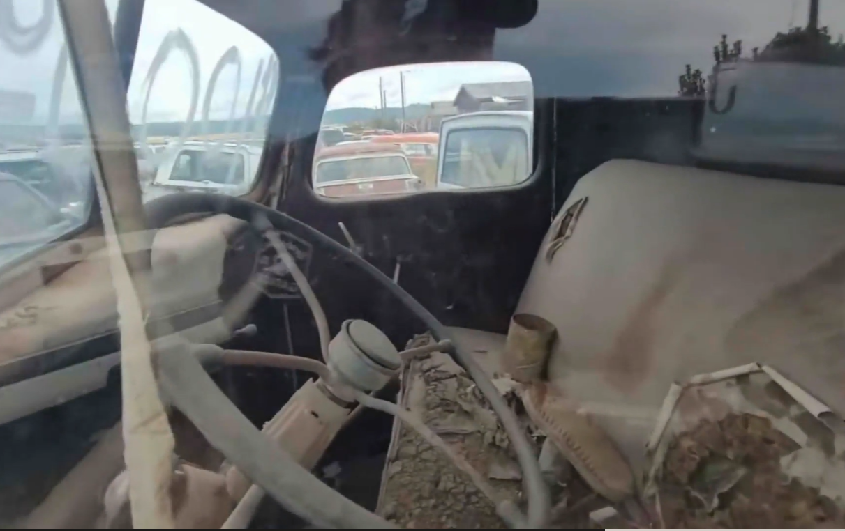 The inside of the pickup was covered in dirt and the seat was torn open