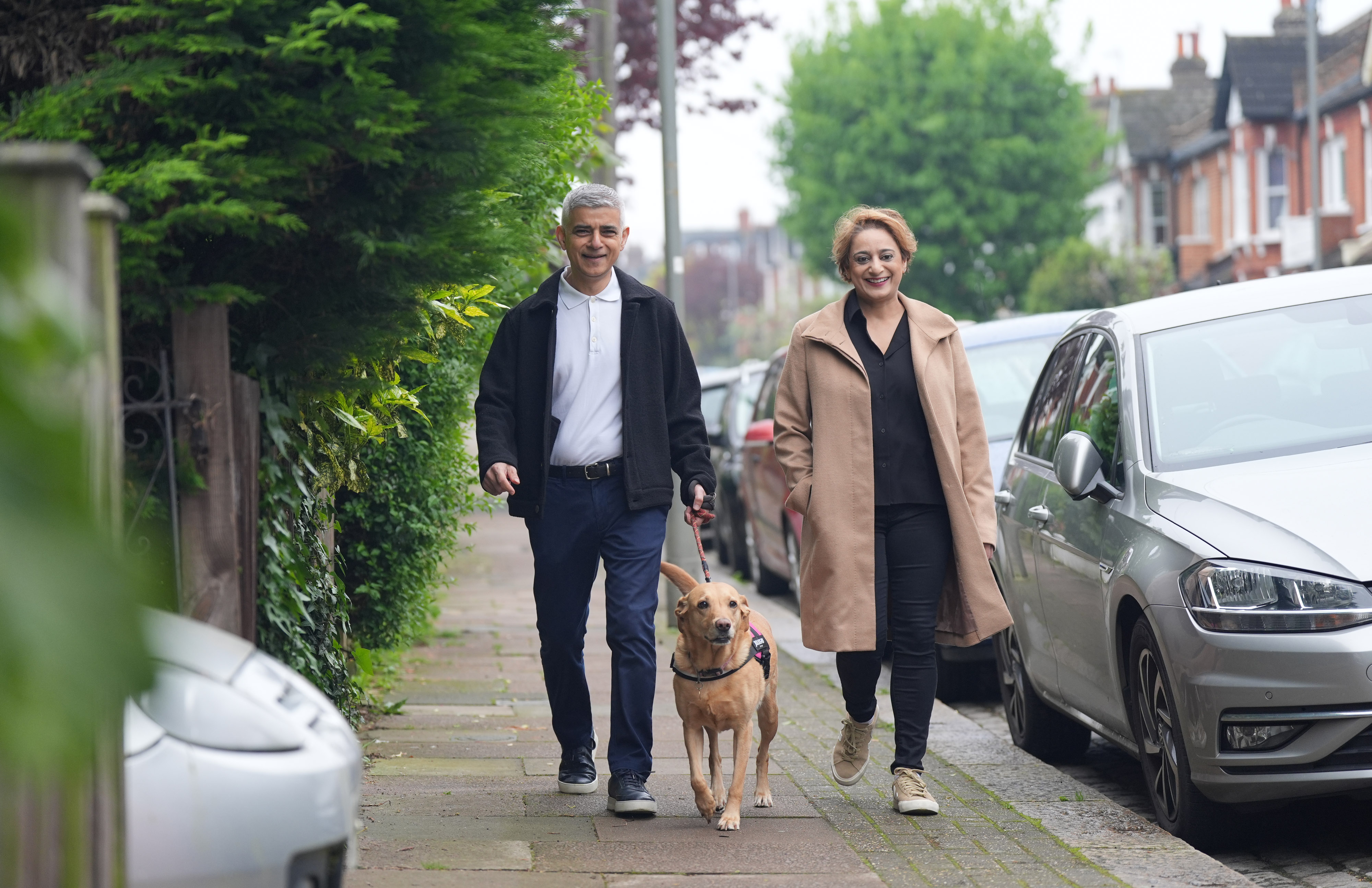 Current Mayor of London Sadiq Khan and wife Saadiya Khan headed along this morning, too - with dog Luna